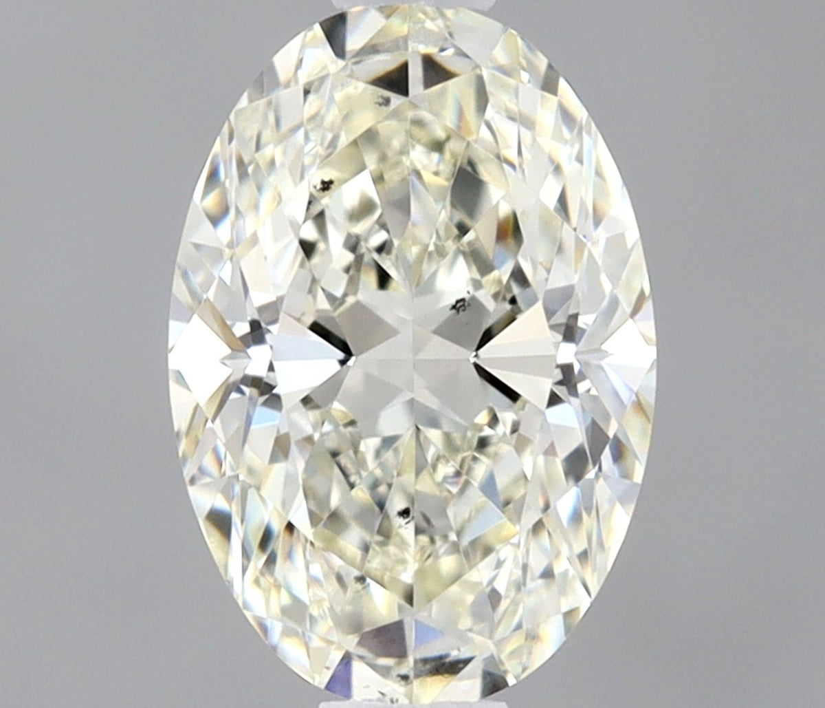 Diamante Naturale Taglio Ovale 0.52ct EX/EX J VS2 - IGI - 6.51x4.48x2.71mm