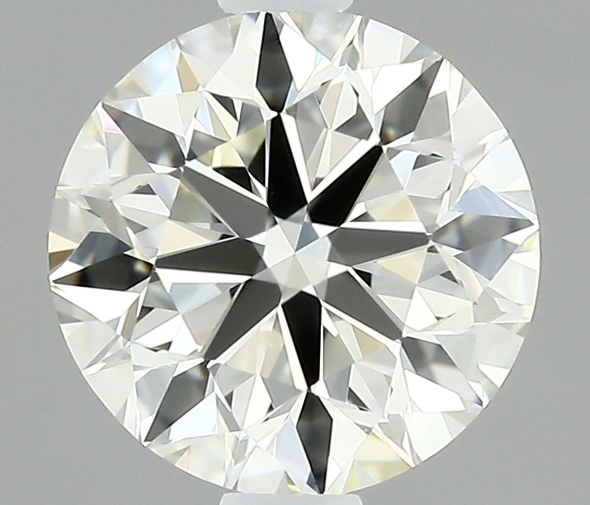 Diamante Naturale Taglio Brillante 0.9ct 3EX J VVS1 - IGI - 6.05x6.12x3.86mm