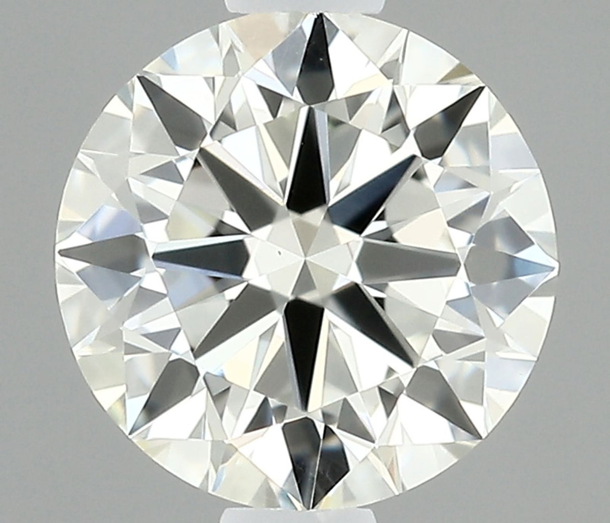 Diamante Naturale Taglio Brillante 0.59ct 3EX J VVS2 - IGI - 5.33x5.38x3.25mm