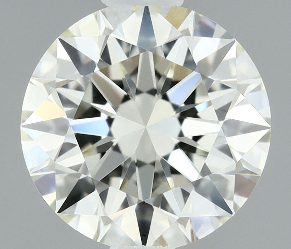 Diamante Naturale Taglio Brillante 0.6ct 3EX J VVS1 - IGI - 5.38x5.4x3.34mm