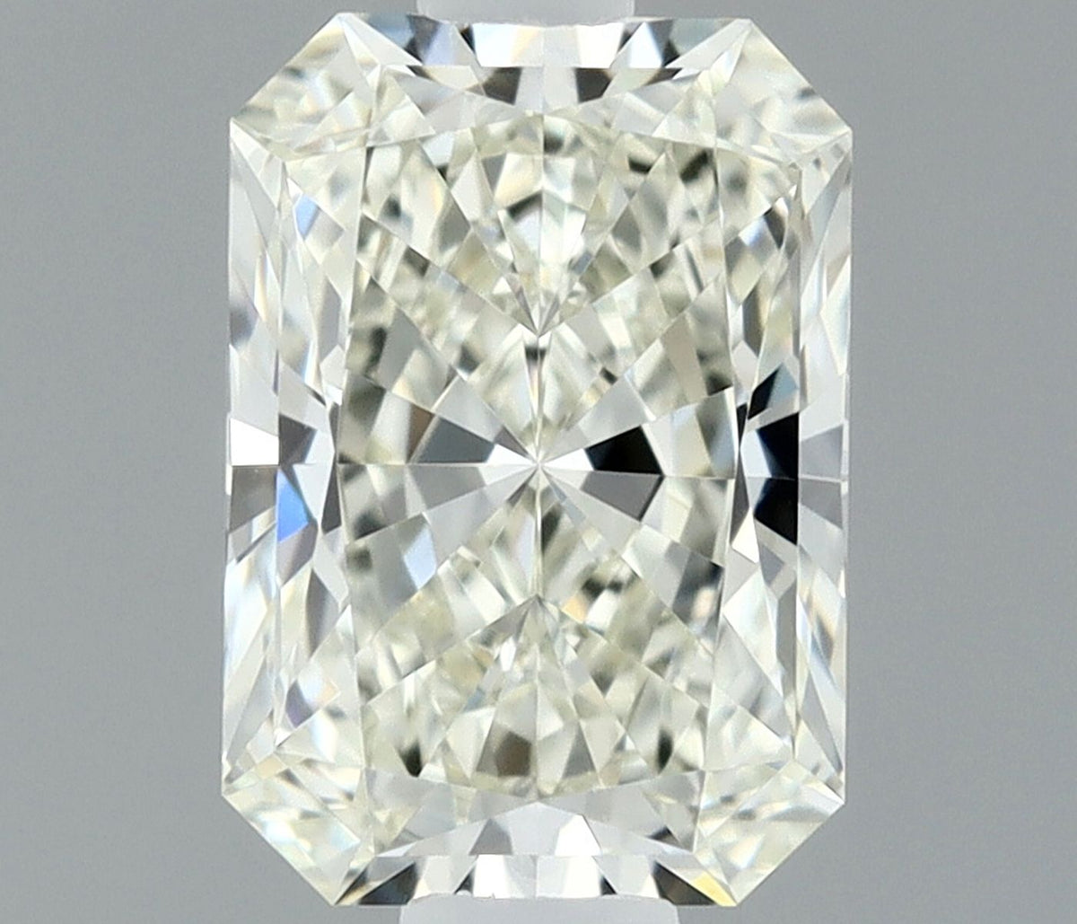 Diamante Naturale Taglio Radiant 0.54ct EX/EX J VVS1 - IGI - 5.84x4.09x2.77mm
